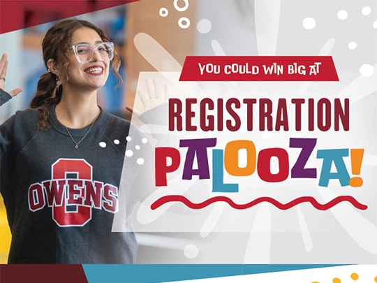 Owens student with arms raised in celebration for Reg Palooza