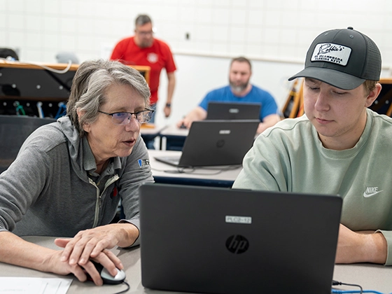 instructor with student in class