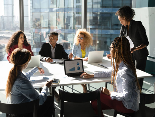 Group of corporate employees in a meeting having a discussion