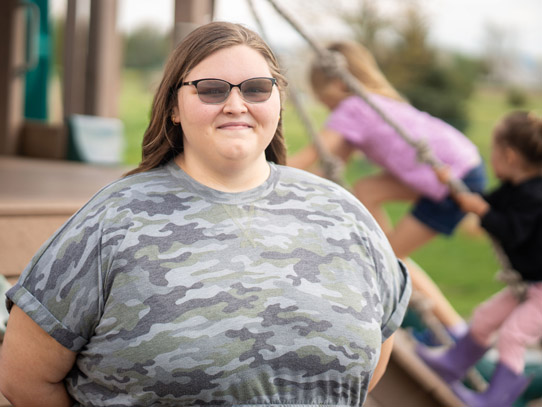 Girl looking at camera smiling